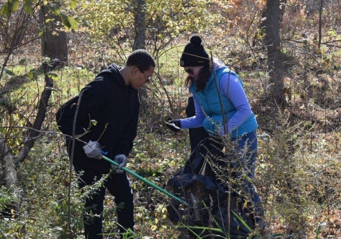 Cleaning up a nature trail with the Mass Audobon Society